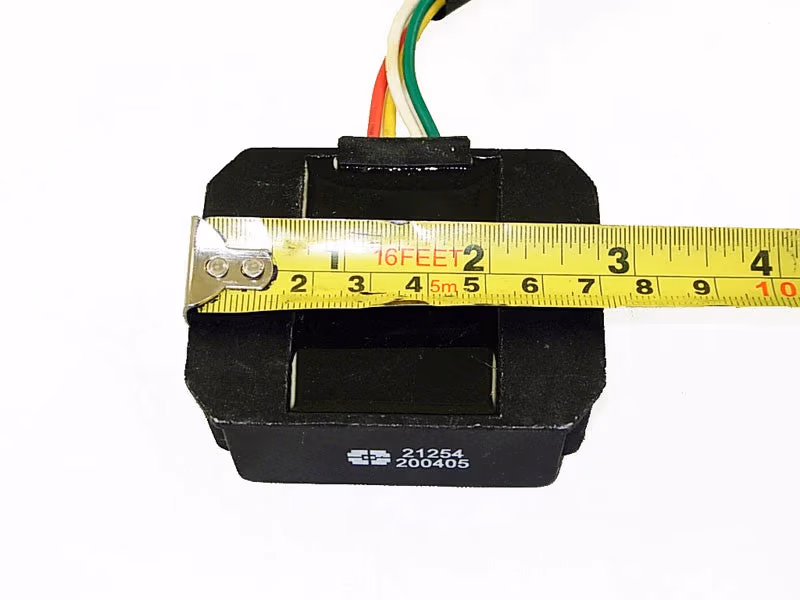 GY6 50cc-250cc Voltage Regulator Rectifier: 4-wire part for dirt bikes & scooters, with measurement tape.